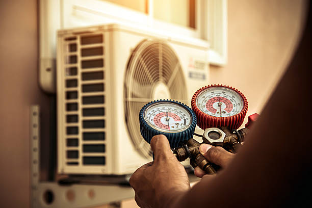 Professional Hvac technician working in Berkley, MA